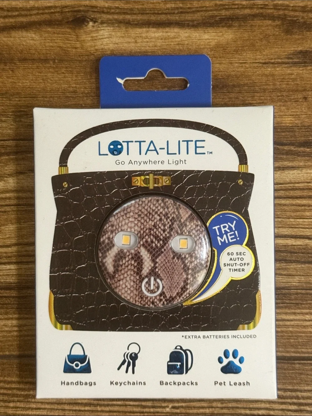The snakeskin Lotta-Lite graphic-print LED clip-on light.